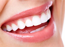 Closeup of beautiful smile with dental crowns